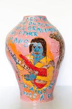 Large pink, blue and yellow ceramic vase hand painted with an image of a man playing guitar